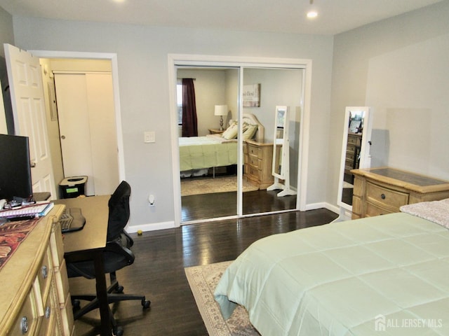 bedroom with baseboards, a desk, a closet, wood finished floors, and recessed lighting