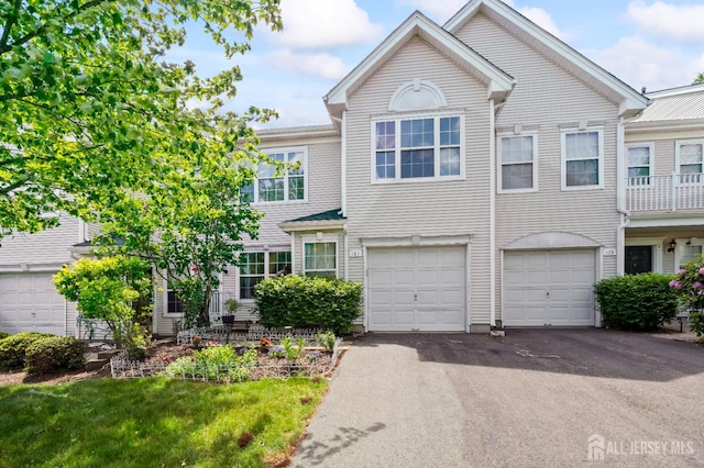 181 Windsong Cir E, Brunswick, NJ 08816 - view of property with driveway and a garage