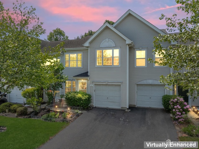 181 Windsong Cir E, Brunswick, NJ 08816 - view of front of house with asphalt driveway and a garage