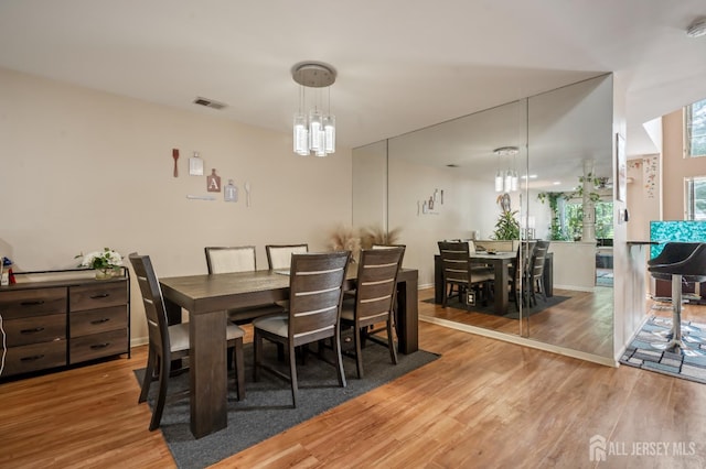 181 Windsong Cir E, Brunswick, NJ 08816 - dining room with a chandelier and wood finished floors