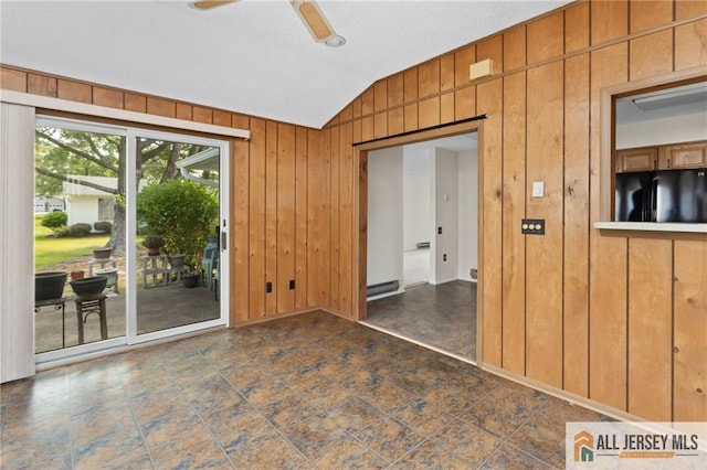 747 Marlton Rd Unit 747A, Monroe, NJ 08831 - empty room with lofted ceiling, wood walls, and ceiling fan