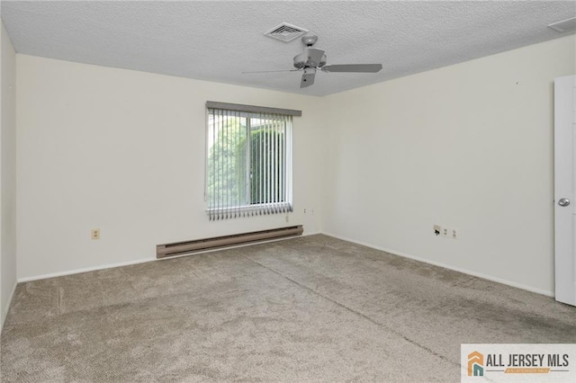 747 Marlton Rd Unit 747A, Monroe, NJ 08831 - spare room featuring a baseboard radiator, ceiling fan, carpet floors, a textured ceiling, and baseboards