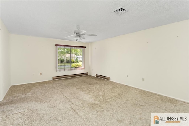 747 Marlton Rd Unit 747A, Monroe, NJ 08831 - spare room featuring a baseboard heating unit, ceiling fan, and carpet