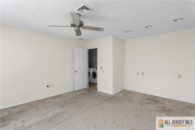 747 Marlton Rd Unit 747A, Monroe, NJ 08831 - spare room with washing machine and dryer, carpet flooring, ceiling fan, and a textured ceiling