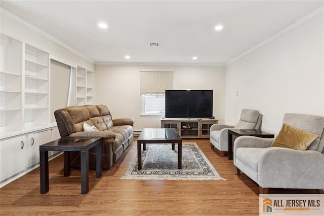 living area featuring recessed lighting, wood finished floors, visible vents, ornamental molding, and baseboard heating