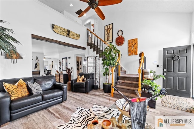 68 Winthrop Rd Unit 68B, Monroe, NJ 08831 - living area with a ceiling fan, high vaulted ceiling, stairway, and light wood finished floors