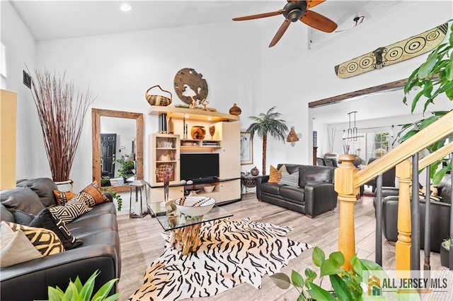 68 Winthrop Rd Unit 68B, Monroe, NJ 08831 - living area with ceiling fan, wood finished floors, and a towering ceiling