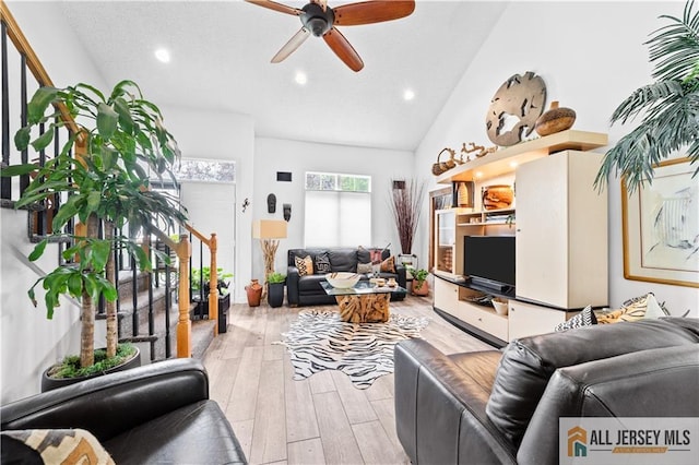 68 Winthrop Rd Unit 68B, Monroe, NJ 08831 - living area featuring recessed lighting, a ceiling fan, light wood-type flooring, stairway, and high vaulted ceiling