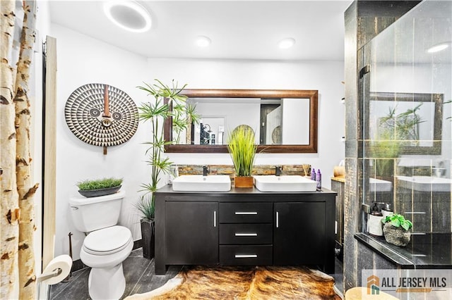 68 Winthrop Rd Unit 68B, Monroe, NJ 08831 - bathroom with double vanity, toilet, a shower with door, and recessed lighting