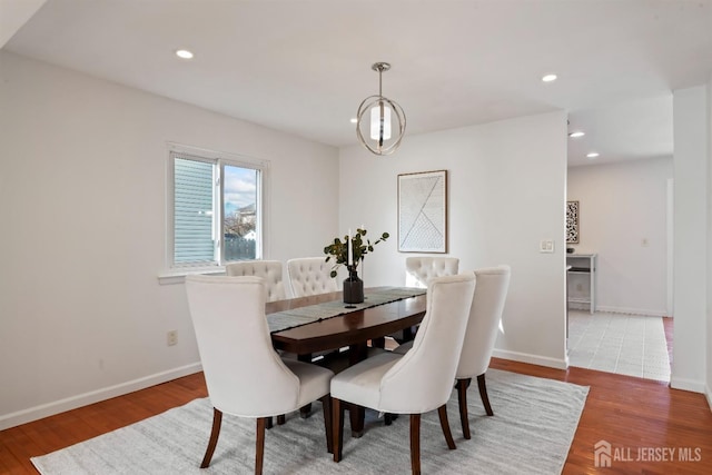 dining room with hardwood / wood-style floors