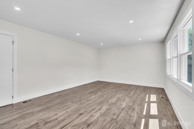 18 Heritage Dr, Edison, NJ 08820 - empty room featuring wood finished floors, recessed lighting, and baseboards