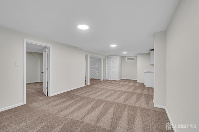 18 Heritage Dr, Edison, NJ 08820 - finished below grade area with carpet flooring, baseboards, and recessed lighting
