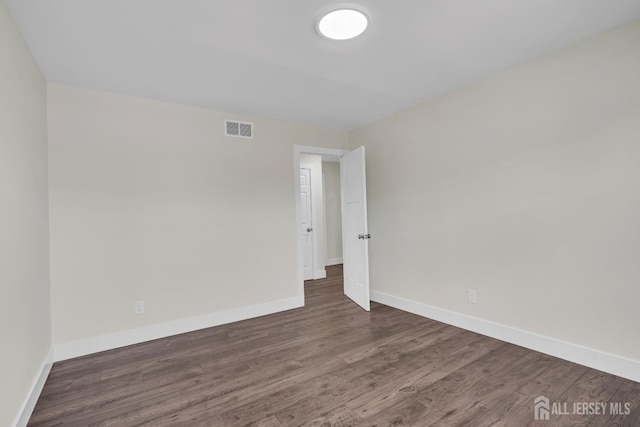 18 Heritage Dr, Edison, NJ 08820 - unfurnished room with baseboards and wood finished floors