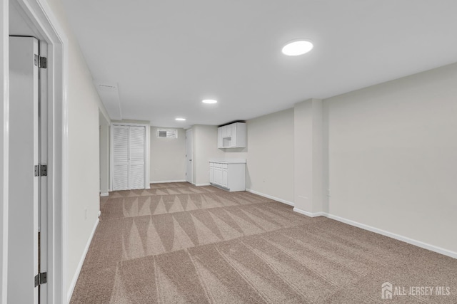 18 Heritage Dr, Edison, NJ 08820 - finished below grade area with light carpet and recessed lighting