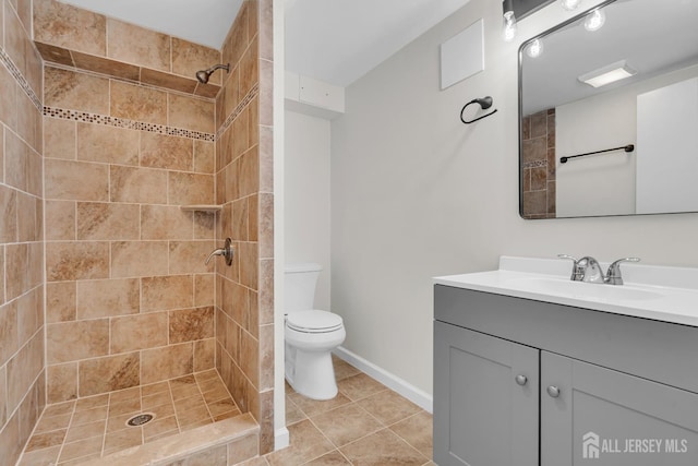 18 Heritage Dr, Edison, NJ 08820 - full bathroom featuring vanity, toilet, tiled shower, and tile patterned flooring