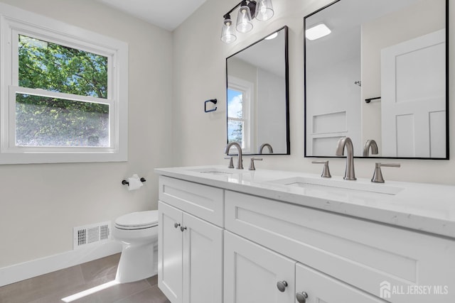 18 Heritage Dr, Edison, NJ 08820 - full bath with toilet, double vanity, and tile patterned floors