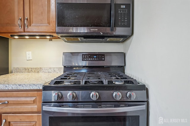 114 Pine Island Ter, Old Bridge, NJ 07735 - kitchen featuring stainless steel appliances and light countertops