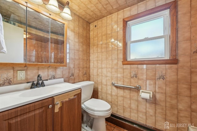 114 Pine Island Ter, Old Bridge, NJ 07735 - bathroom featuring tile walls, vanity, and toilet