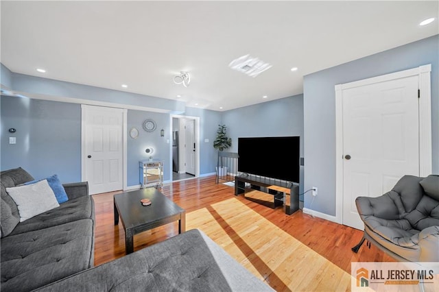 living room with hardwood / wood-style floors