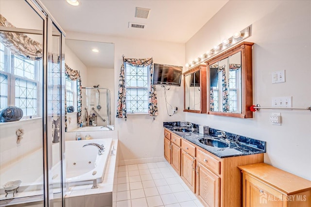 full bath with visible vents, a stall shower, vanity, and a whirlpool tub