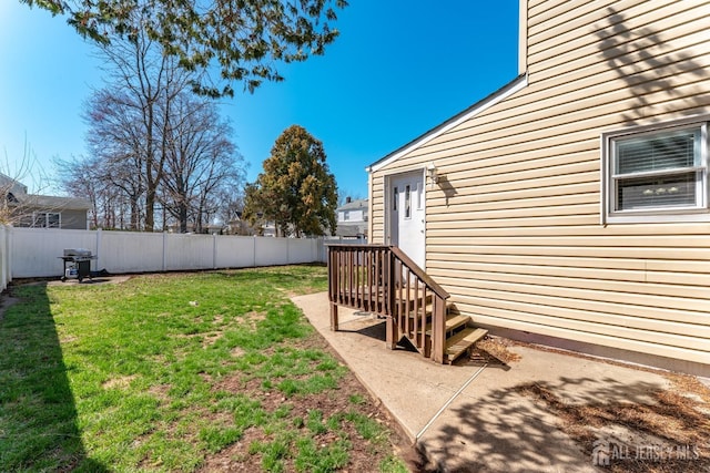 view of yard featuring a fenced backyard