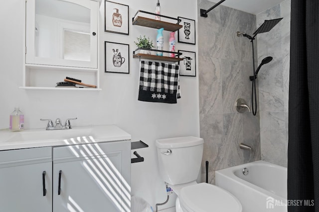 bathroom featuring shower / bath combo, vanity, and toilet