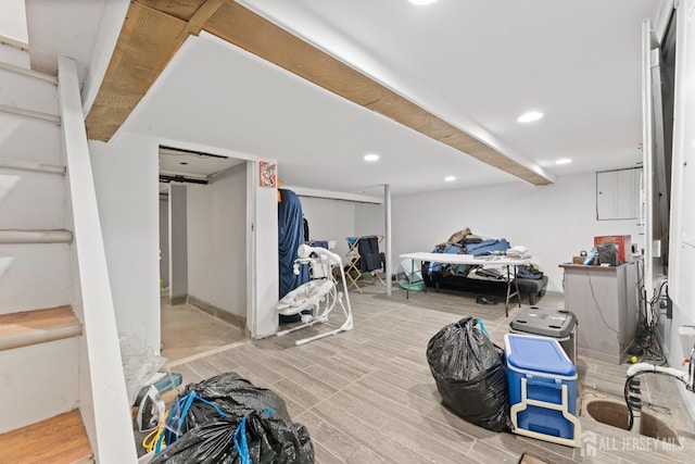 bedroom with wood finished floors and recessed lighting