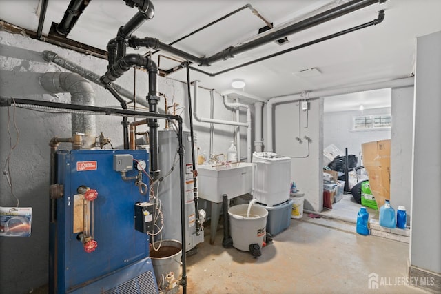 utilities with water heater and a sink