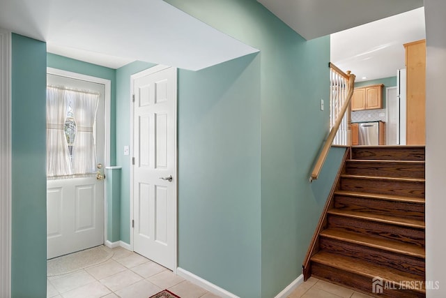 46 Hosford Ave, Leonardo, NJ 07737 - entryway featuring light tile patterned floors, stairway, and baseboards
