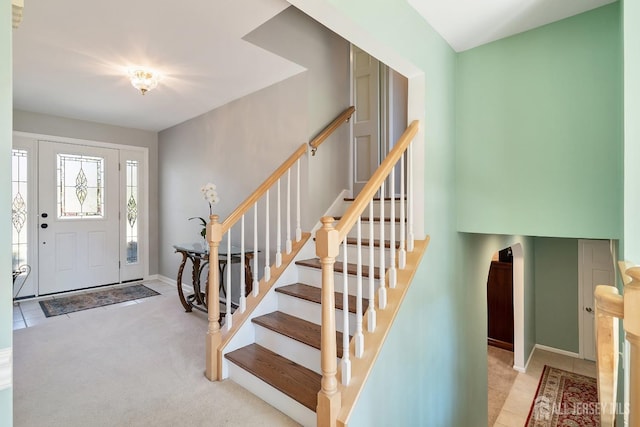 46 Hosford Ave, Leonardo, NJ 07737 - carpeted entrance foyer with arched walkways, stairs, and baseboards