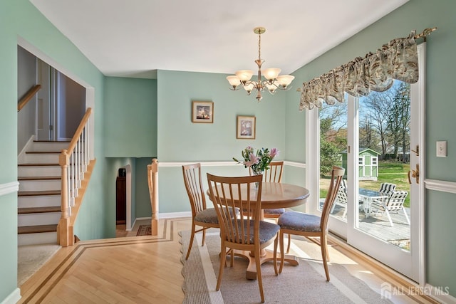 46 Hosford Ave, Leonardo, NJ 07737 - dining area with a chandelier, wood finished floors, and stairs