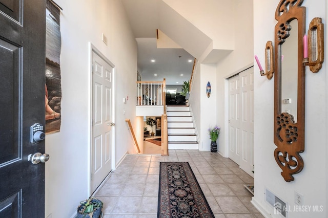 31 Capica Ct Unit 79, Old Bridge, NJ 08879 - entryway featuring tile patterned floors, stairs, and recessed lighting
