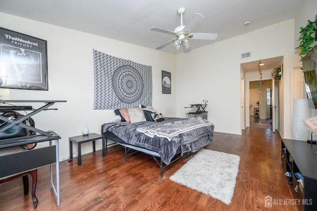 31 Capica Ct Unit 79, Old Bridge, NJ 08879 - bedroom with wood finished floors, a ceiling fan, and baseboards