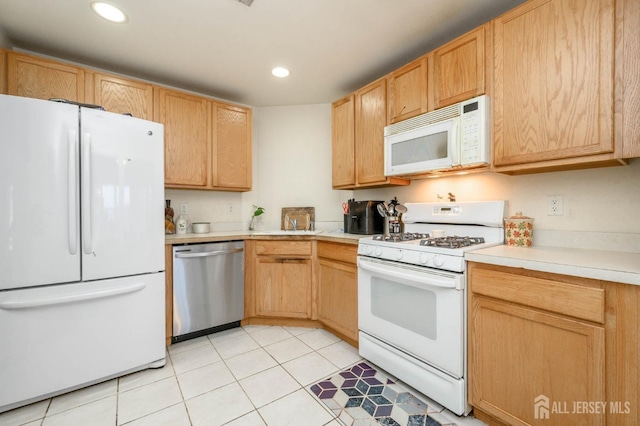 31 Capica Ct Unit 79, Old Bridge, NJ 08879 - kitchen featuring white appliances, light countertops, recessed lighting, light tile patterned floors, and light brown cabinets