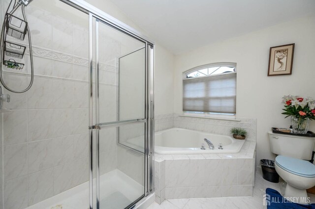 31 Capica Ct Unit 79, Old Bridge, NJ 08879 - bathroom with a garden tub, a stall shower, and vaulted ceiling