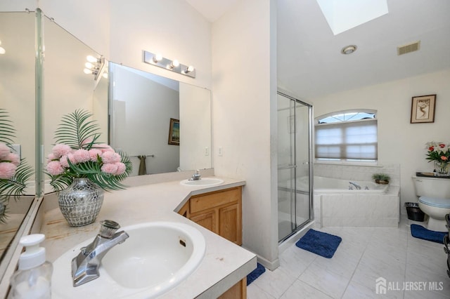 31 Capica Ct Unit 79, Old Bridge, NJ 08879 - full bath featuring a skylight, double vanity, a bath, a shower stall, and high vaulted ceiling