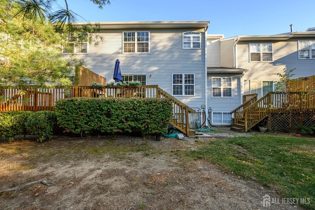 31 Capica Ct Unit 79, Old Bridge, NJ 08879 - back of property featuring stairs and a deck