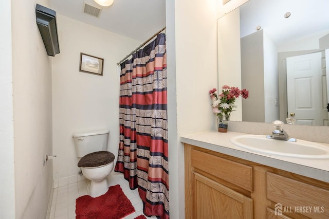 31 Capica Ct Unit 79, Old Bridge, NJ 08879 - full bath featuring toilet, vanity, tile patterned floors, and a shower with curtain