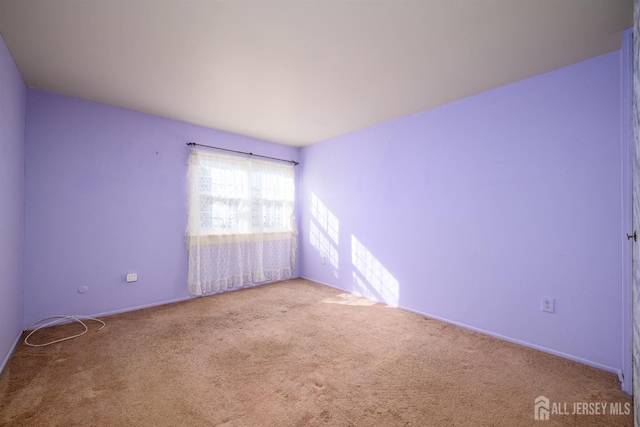 view of carpeted spare room