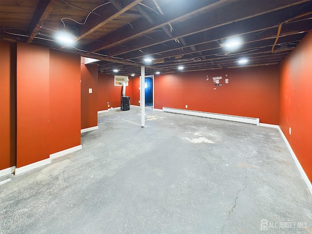 basement with a baseboard heating unit