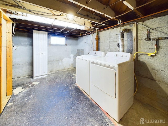 basement featuring separate washer and dryer