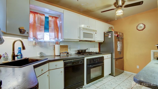 kitchen featuring white cabinetry, sink, ceiling fan, and black appliances