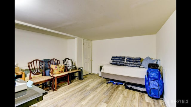 bedroom with wood finished floors