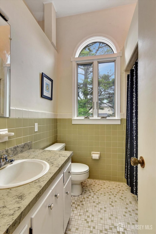 25 Deer Path, Holmdel, NJ 07733 - full bathroom with vanity, tile walls, and a shower with shower curtain