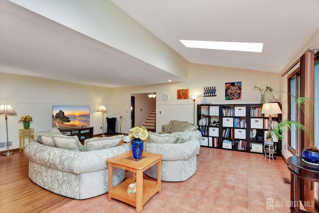 25 Deer Path, Holmdel, NJ 07733 - living room with stairway, lofted ceiling, and a skylight