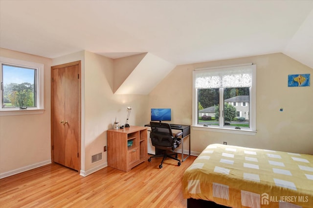 25 Deer Path, Holmdel, NJ 07733 - bedroom with light wood-style flooring, lofted ceiling, and an office area