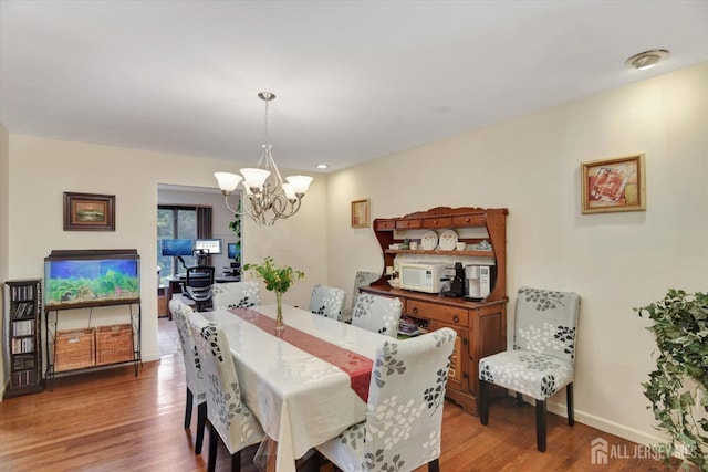 25 Deer Path, Holmdel, NJ 07733 - dining room featuring a chandelier and wood finished floors
