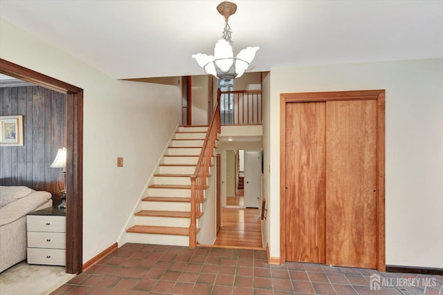 25 Deer Path, Holmdel, NJ 07733 - stairs with a chandelier and tile patterned floors