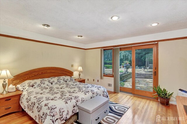 25 Deer Path, Holmdel, NJ 07733 - bedroom featuring access to outside, light wood finished floors, a textured ceiling, and recessed lighting