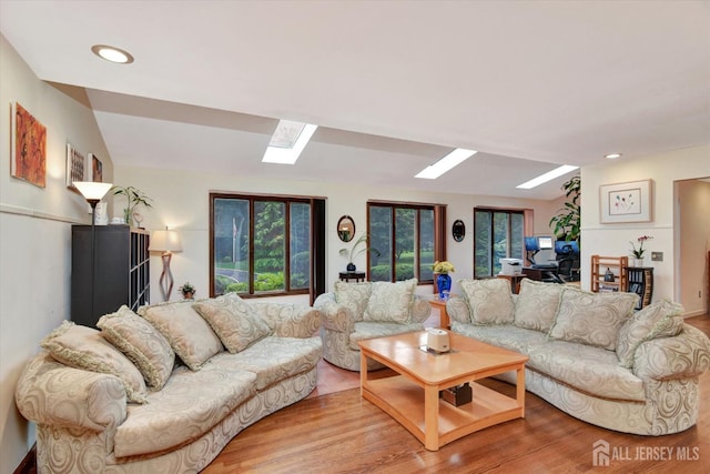 25 Deer Path, Holmdel, NJ 07733 - living area with a skylight, wood finished floors, and recessed lighting